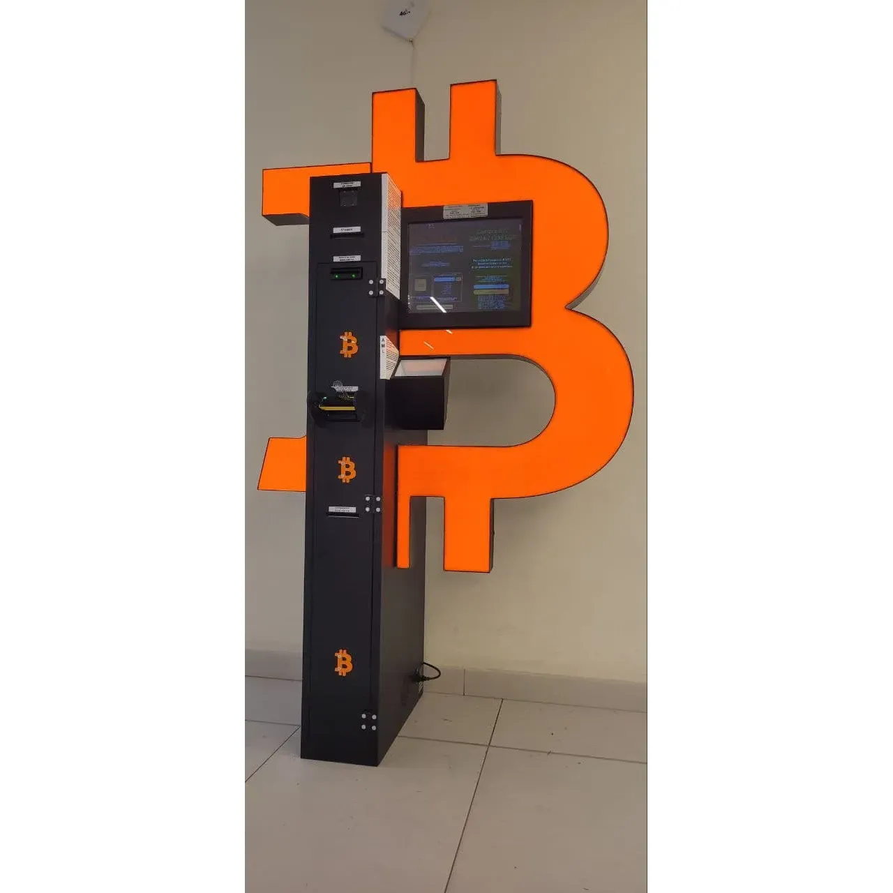 Bancomat Bitcoin ATM by Shitcoins.club offers a cutting-edge solution for cryptocurrency enthusiasts and individuals looking to engage with digital currencies. Positioned in a prime location on the first floor for easy access, this ATM provides a seamless and convenient service for transactions involving Bitcoin and other prominent cryptocurrencies.

With its user-friendly interface, the Bitcoin ATM allows for quick initiation of transaction processes, including straightforward loading of QR codes, essential for efficient and hassle-free trades. In addition to its technological efficiency, the ATM is supported by a dedicated customer support team, ready to assist users with any queries or guidance required during the transaction process.

Shitcoins.club prides itself on catering to the needs of its customers by delivering a swift, reliable, and modern cryptocurrency exchange experience. Their Bitcoin ATM service is a reflection of their commitment to empowering customers in the ever-evolving world of digital finance. Description by ChatGPT.