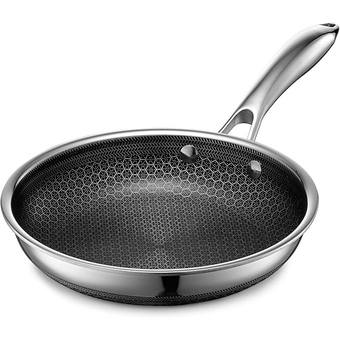 The HexClad Hybrid Nonstick Frying Pan is an 8-inch pan designed with a unique combination of stainless steel and nonstick technology. The pan features a patented hexagon design that allows for even heat distribution and optimal cooking performance.