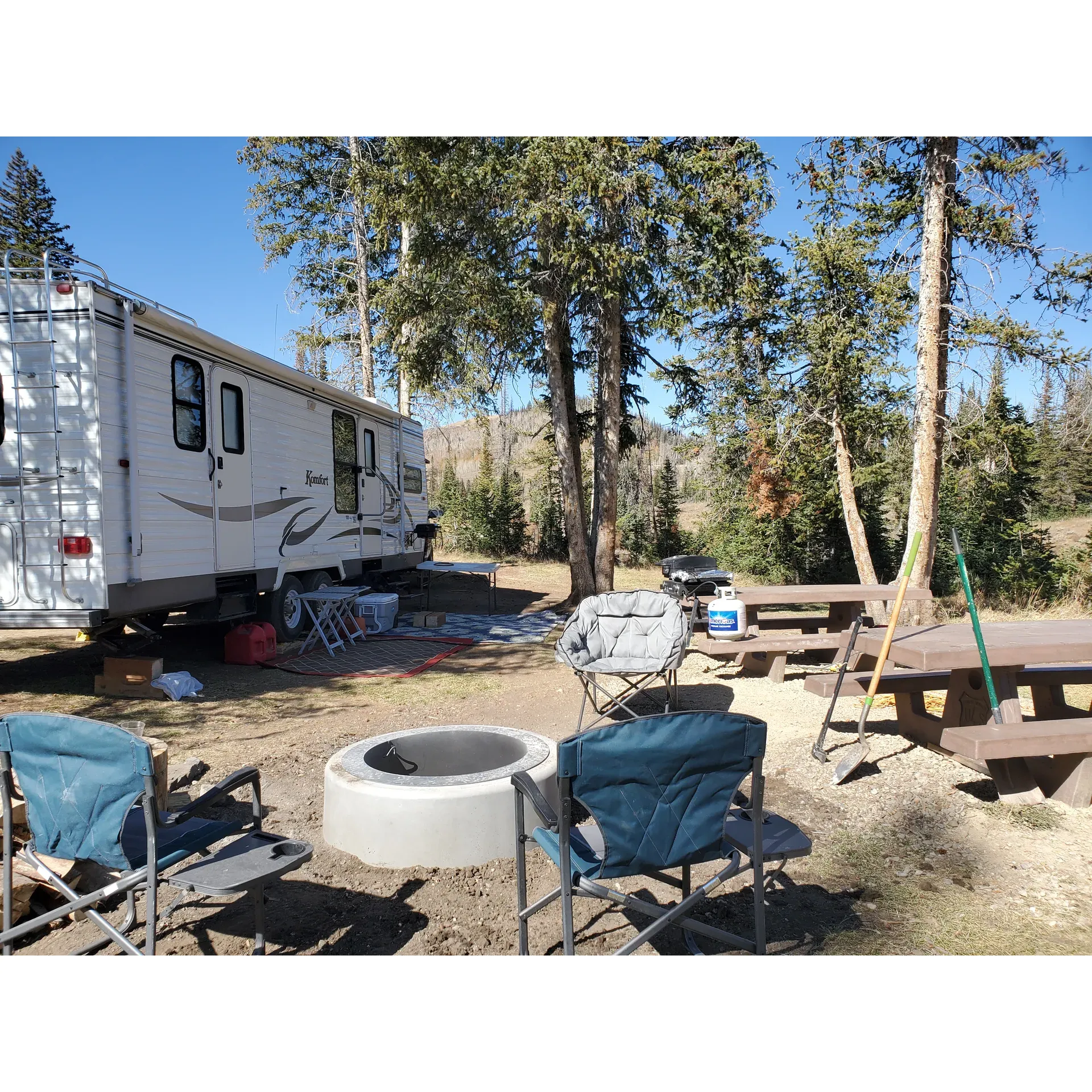 Lake Canyon Recreation Area Campground is an idyllic haven for outdoor enthusiasts who revel in a variety of recreational activities. It has earned a reputation as one of the favorite camping spots for both regular visitors and adventurers who return annually to enjoy the tranquility and excitement it offers.

The shimmering reservoirs in close proximity to the campgrounds are ideal for guests looking to glide on kayaks and paddleboards across the calm waters, embracing the scenic beauty that surrounds them. While some larger bodies of water offer modest results, anglishes thrive on catching their bounty at more intimate spots such as Beaver Pond Reservoir, with dusk at Miller Flat Reservoir providing particularly enjoyable fishing experiences that are perfect for creating lasting memories with children.

The enthralling ATV trails draw in families, offering exhilarating rides through the wilderness for those with motorcycles. It's a hotspot for those who love the hum of engines and the thrill of off-road exploration, with well-maintained trails that accommodate both novice and experienced riders.

The area operates on a self-sufficient ethos where nature lovers can appreciate the unspoiled surrounds. With a "pack-it-in, pack-it-out" policy, campers are encouraged to minimize their environmental footprint, contributing to the pristine condition of the natural habitat.

Designed for those who find comfort in the rustic outdoors, the campground's 'boondocking' experience means campers can immerse themselves in nature without the distractions of modern hookups. Despite this return to basics, the campgrounds are equipped with the occasional vault toilet to add a level of convenience to the rugged camping experience.

Each campsite, decorated with a traditional fire ring, promises a night under the stars where tales and marshmallows are shared in the soft glow of a campfire. While amenities are deliberate in their simplicity, the emphasis is on enjoying the raw beauty of the forest.

Visitors can find solace in the cool temperatures and the presence of wildlife, with curious deer often spotted wandering without fear. The sprawling high-altitude recreation area offers breath-taking views and abundant space for both individual families and larger groups to find their special corner in the wilderness.

Lake Canyon Recreation Area Campground is a true retreat for those seeking beauty, peace, and a touch of adventure in the great outdoors. It's a place where memories are made, traditions continue, and the call of the wild is met with the heart of adventure. Description by ChatGPT.