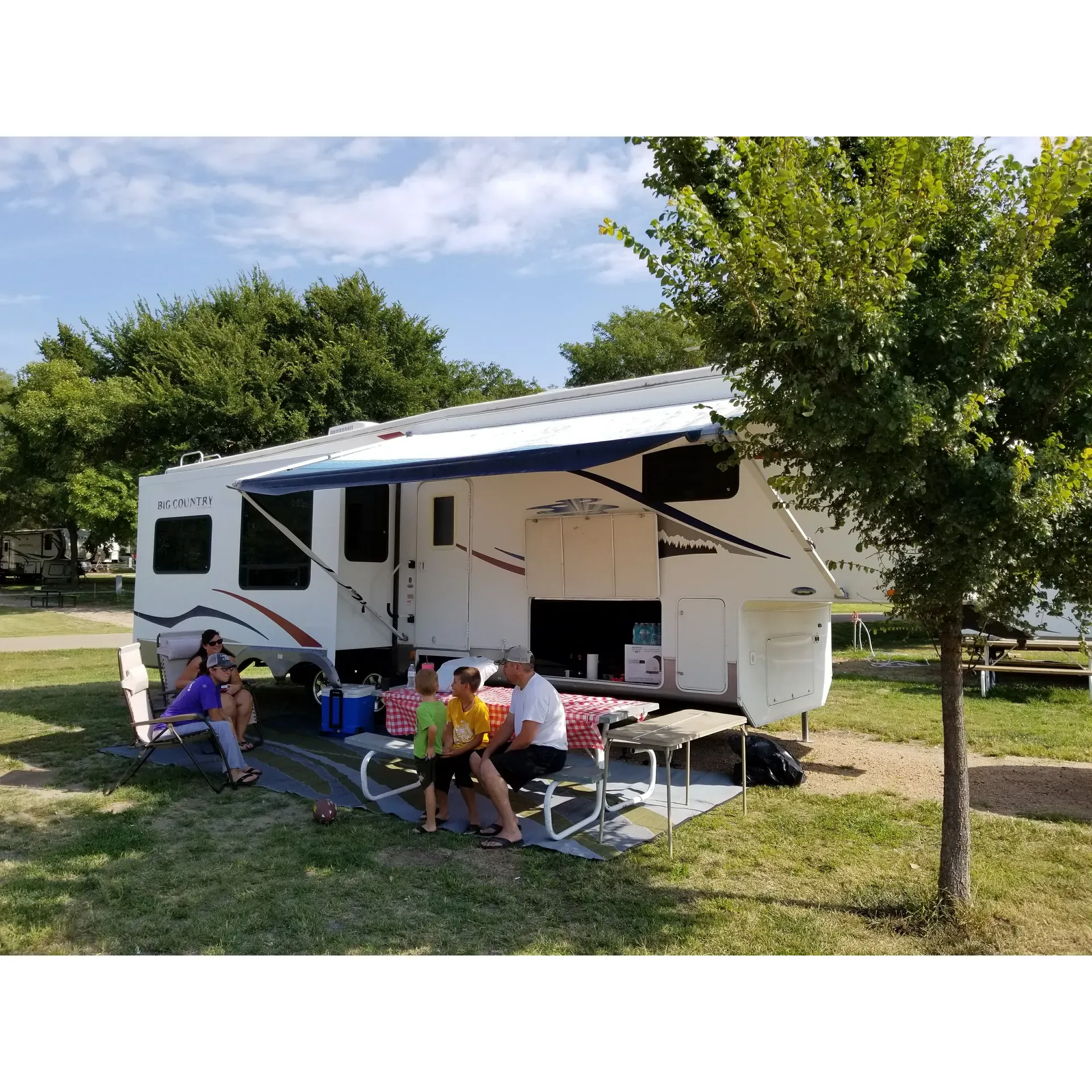 North Shore Campground is a vibrant outdoor retreat that boasts an array of amenities for visitors seeking a fun-filled lakeside experience. The campground is a popular destination for families and friends looking to enjoy quality time in a picturesque setting. With its own marina, guests can indulge in delicious meals and exceptional service, elevating their dining experience right by the water. Adventure enthusiasts will find plenty to do, with a wide range of activities that appeal to all ages.

As a cherished spot for lake-goers, North Shore Campground provides a variety of camping options, with certain areas enveloped by tranquil rings of trees, ensuring a serene and private getaway. While the campsite offers different levels of proximity to the water, it guarantees a clean and well-maintained environment for all guests.

Visitors can revel in peaceful nights under the stars, complemented by breathtaking views, ensuring a restful and rejuvenating stay. The campground is also an ideal hub for angling enthusiasts, with limited yet exclusive areas designated for shore fishing, allowing for a more intimate fishing experience.

North Shore Campground remains committed to delivering a memorable outdoor escape where the beauty of nature and the warmth of community come together to create the ultimate lakeside vacation. Description by ChatGPT.