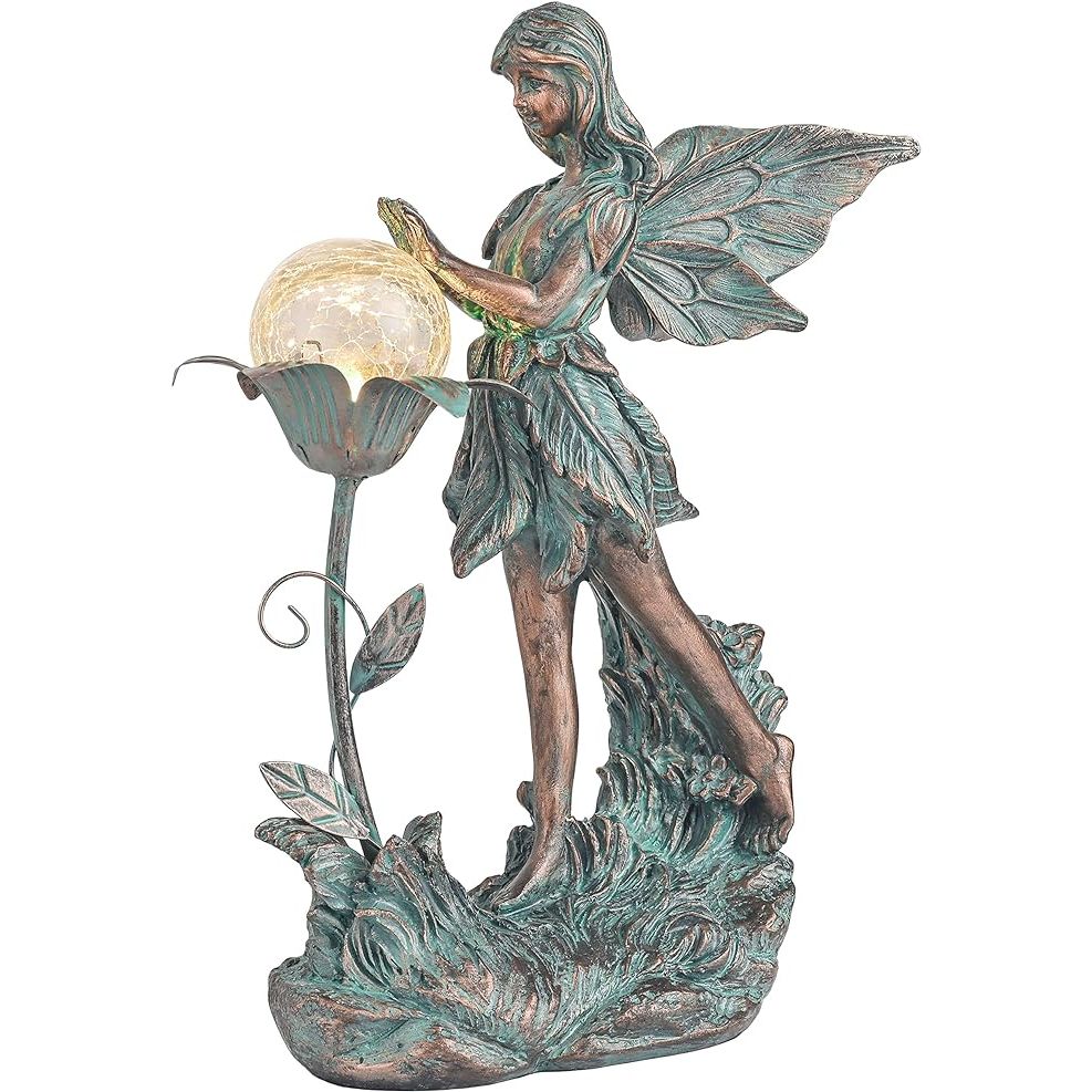 Add a touch of magic to your garden with this stunning garden fairy statue. With its original design featuring a standing fairy holding a flower and an illuminating crackle glass globe, this statue brings a stunning glow and amazing light effect to any outdoor space.