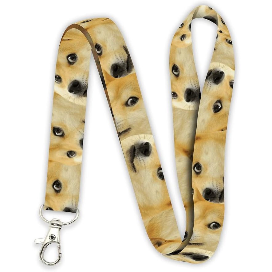 The Doge Much Wow Meme Shiba Inu Premium Lanyard Keychain is a fun and quirky accessory featuring the popular Doge Much Wow meme and the recognizable Shiba Inu dog breed. The lanyard keychain is made of durable materials, ensuring a long-lasting product that can withstand daily use.