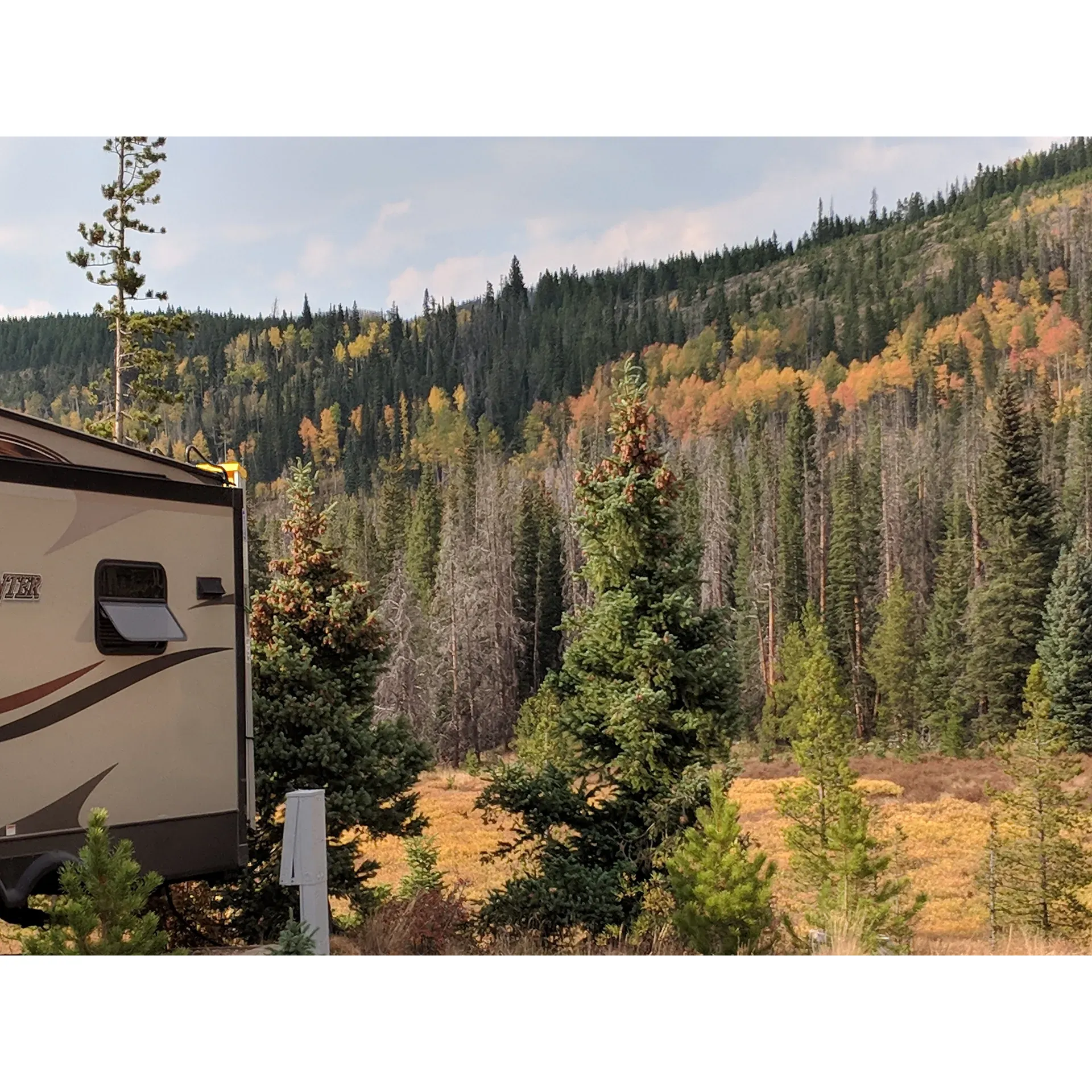 Immerse yourself in the serene beauty of the great outdoors at Ranger Lakes Campground, a destination revered for its stunning natural landscape and an abundance of wildlife sightings, especially moose. Experience the charm of remote wilderness complemented by the conveniences you desire while camping. With ample amenities to meet your needs, this campground provides an array of outdoor activities, from hiking enchanting trails to biking through scenic routes, along with fishing and the freedom of dispersed camping that offers breathtaking views. 

Enthusiasts can explore the splendor of Rocky Mountain National Park, with its easy access leading to further adventures in Walden, making the journey an integral part of the experience. Visitors can indulge in the tranquility of site 128, a camper's delight with its close proximity to lakeside trails, gently flowing streams, and abundant space for leisure and relaxation. Desirable features such as well-maintained, level sites make setup a breeze, and you’ll find spots perfect for hammocks, granting moments of bliss under the canopy of the sky.

Adventurous souls looking to delve deeper into the wild can embark on exhilarating hikes to American Lakes and Lake Agnes, knowing that the comforts of well-kept facilities await their return. While the camp hosts maintain a quieter presence, the nearby Moose Visitor Center provides resources like firewood to ensure that your experience is nothing short of perfect. 

Accessibility is a consideration to keep in mind, as the natural, rugged terrain of the campground may pose challenges for some, signaling the untouched character of the park. Embrace the call of the wild as you encounter the raw beauty of dirt pathways and gravel, each step a reminder of the pure essence of nature that Ranger Lakes Camphouse proudly preserves. Come create unforgettable memories in the heart of a place where the majesty of wildlife and the vastness of the landscape coalesce, promising an authentic camping experience that is as delightful as it is extraordinary. Description by ChatGPT.