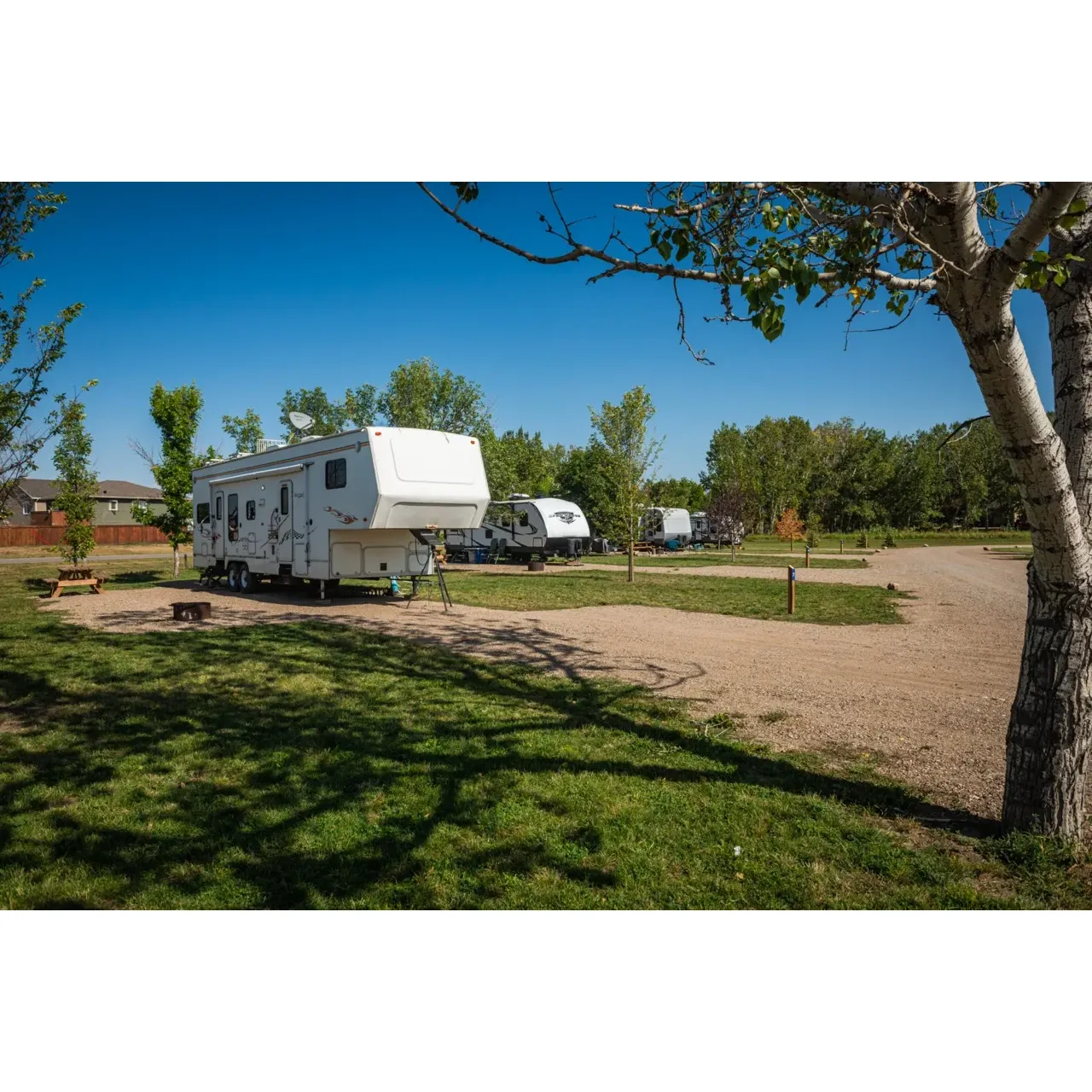 Owl's' Campground provides an idyllic sanctuary for travelers any time of year, conveniently catering to both seasonal snowbirds and year-round adventurers. Its prime location in Coaldale is just a stone's throw from the charming downtown area, offering a tranquil alternative to bustling urban RV parks. This campground prides itself on spacious sites that afford privacy and comfort, allowing guests to relax without the proximity to neighbors commonly found elsewhere.

With each site equipped with both electrical hookups and a personal fire pit, campers can enjoy modern amenities alongside the traditional joys of a crackling campfire. Guests seeking to unwind in the great outdoors will find the sprawling picnic shelter, readily accessible trails for walking and biking, and the nearby dog park perfect for pet owners—all harmonizing to create a sense of community and enjoyment.

The service at Owl's Campground is noteworthy, with commendations for Trevor's exceptional customer service and dedication to maintaining a clean and welcoming environment. His attentiveness and responsiveness enhance guest experiences, exemplifying the campground's commitment to hospitality.

In addition to functional offerings such as free internet access, clean and secure restrooms, and full hookup sites with options for water and sewer, Owl's Campground also captures the hearts of foodies with the unique treat of having high-quality pizza delivered right to your campfire.

With generous site dimensions, thoughtful amenities, and fair pricing, this RV campground not only meets expectations but also garners high recommendations from those who've enjoyed a stay, affirming its reputation as a prime choice for a peaceful retreat with a touch of indulgence. Description by ChatGPT.