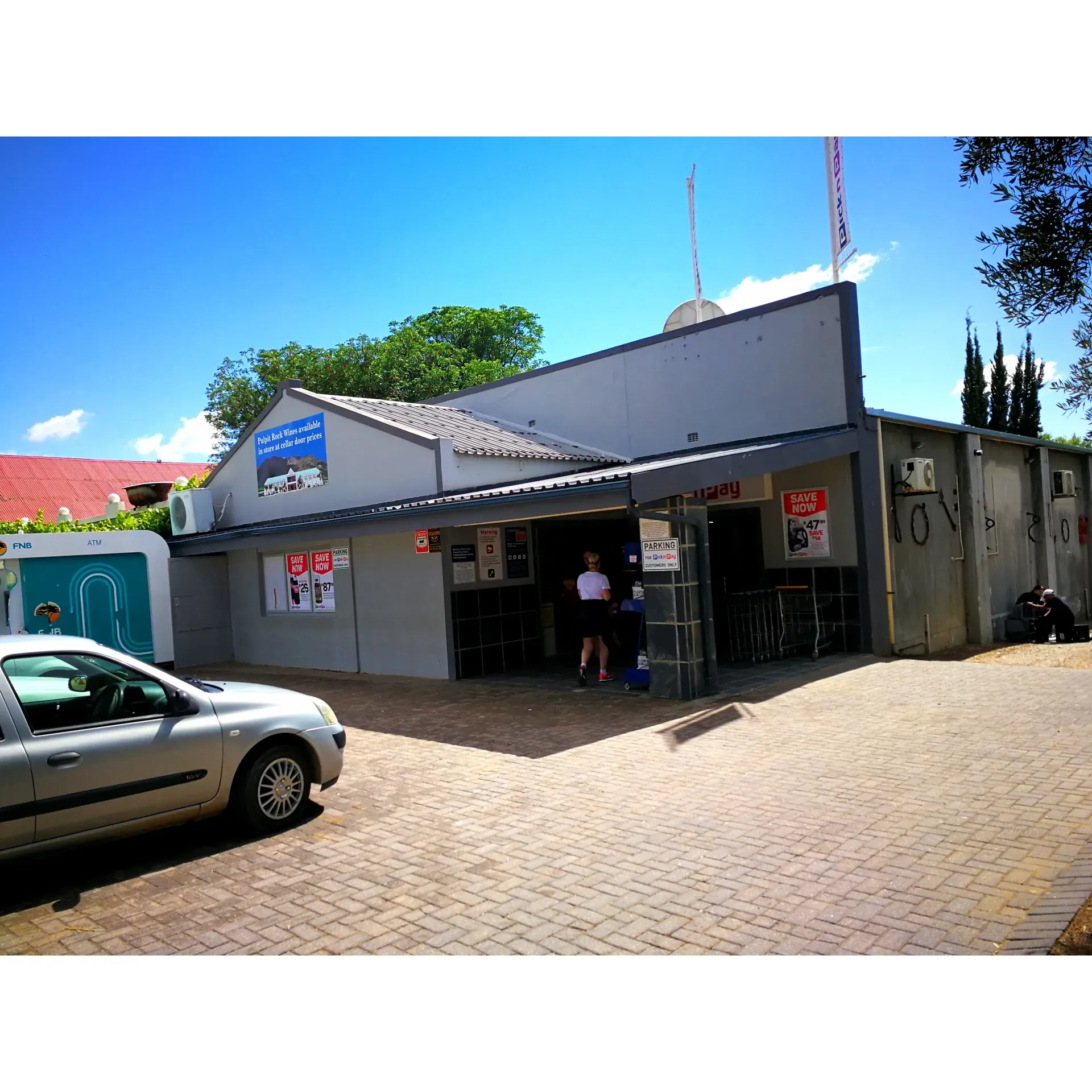 Located in the heart of the tranquil Riebeeck Kasteel, a serene wineyard town, the Pick n Pay Mini Market is a charming local establishment that truly punches above its weight when it comes to delivering a delightful shopping experience. This small but mighty market is beloved by the community for its impressive range of goods that cater to the daily needs and quick meal solutions for the locals and visitors alike.

Upon entering Pick n Pay Mini Market, customers are invariably greeted by the warm and welcoming presence of an awesome security guard, whose friendly banter is the perfect way to feel at home. The entire staff team is known for its friendliness and willingness to engage in a pleasant chat, which adds a personal touch to every visit, making the shopping experience more like visiting a neighbor than a routine errand.

Efficiency is key at this establishment, where the service is brisk without sacrificing the quality of customer care. Shoppers often commend the market on its swift service, ensuring that even a quick stop is as productive as possible. Behind the scenes, the market houses a savoury gem – a section dedicated to homemade delicacies that are a testament to local culinary talent. Their savory offerings are a must-try for anyone looking for a delicious home-cooked treat.

Despite its compact size, customers are consistently surprised by the vast selection of products available, proving that good things do indeed come in small packages. The market regularly features enticing deals on quick meals, perfect for those on the go or for anyone seeking a convenient and tasty dining option without the hassle.

Customer service goes beyond the in-store experience at Pick n Pay Mini Market. The staff is known for their exceptional assistance, and it's no different for telephone inquiries – the helpful and friendly personnel are always ready to extend their support to those not physically in the store.

In summary, Pick n Pay Mini Market in Riebeeck Kasteel serves as an essential hub for the local community, combining the convenience of a well-stocked market with the added value of personal connections and service that goes above and beyond. It is a testament to the town’s golden peace and a true reflection of the value it brings to every square meter it occupies. Description by ChatGPT.