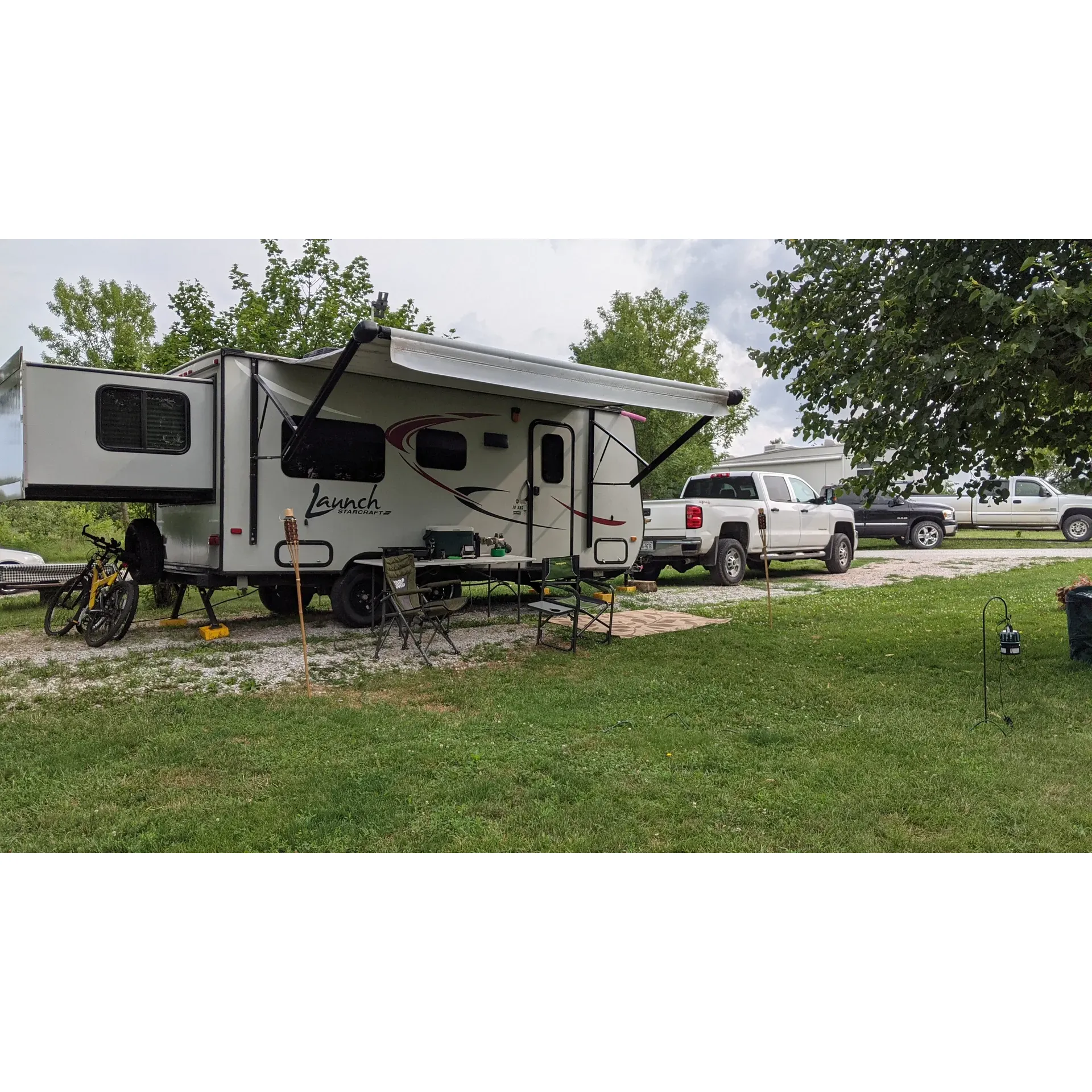 Conestiga Lake Campground is a serene destination for campers seeking both tranquility and adventure. With its gravel, level campsites, the campground is RV-friendly, offering ample space to accommodate your vehicle and additional equipment. While hookups at each site may vary, with some lacking septic or water connections, the available dump station ensures convenience for all guests.

Visitors can enjoy the quiet, scenic environment that lends itself to a peaceful retreat, particularly during the quieter months of late fall, when you can have the picturesque outdoors almost entirely to yourself. The sprawling trails beckon nature lovers and thrill-seekers alike to explore the surrounding beauty on foot.

Renowned for breathtaking vistas, the campground is an idyllic spot for those looking to escape the daily grind. Guests can delight in the stunning lake views, where the cool summer breeze and the spectacle of fireflies create an enchanting atmosphere. Ample fishing opportunities abound in the area, providing a perfect pastime for anglers and novices alike.

Guests can also find comfort in well-maintained amenities, which include personal picnic benches and fire pits at each site, ideal for enjoying a traditional outdoor feast or a cozy campfire. For those who cherish simplicity and convenience, the campground's honor system for payments adds to the relaxed and trusting ambiance of the area.

While some campsites may be cozy in size, they offer the chance to immerse oneself fully in the natural surroundings. The lack of certain luxuries is more than compensated for by the authentic camping experience and the chance to create lasting memories under the open sky.

With a range of costs to accommodate different budgets, Conestiga Lake Campground promises an enjoyable stay for a variety of campers. Phone service is accessible for Sprint, T-Mobile, and Mint users, adding a touch of modern connectivity to the rustic experience.

Whether seeking a quiet getaway spot, a family camping excursion, or a chance to witness the magnificent thunderstorms rolling over the lake, Conestiga Lake Campground invites you to return time and time again to this little slice of outdoor paradise. Description by ChatGPT.