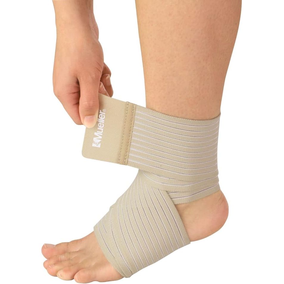 The Mueller Sports Medicine All-Purpose Support Wrap is a versatile compression wrap designed to provide support for joints and muscles in both men and women. It is adjustable and can be used for various body parts, making it a versatile option for athletes and individuals dealing with injuries or chronic pain.