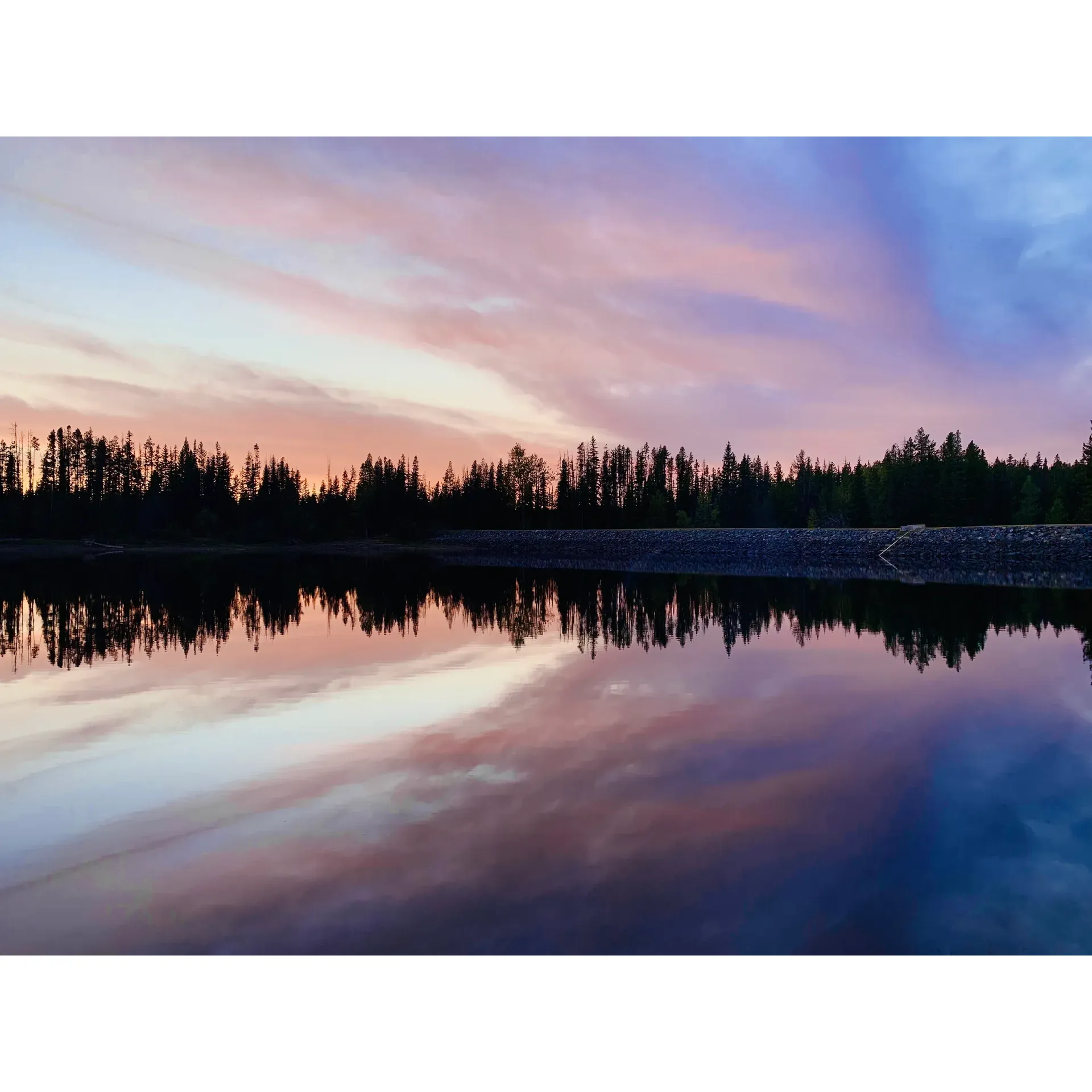 Postill Lake Recreation Site is an idyllic outdoor enthusiast's haven offering an immersive experience in angling and water sports. With its crystal-clear waters, it serves as an excellent entry point for those looking to indulge in serene morning fishing, as well as those eager to explore the area by canoe or kayak. The pristine environment of Postill Lake presents an opportunity for visitors to find tranquility while engaging in their favorite aquatic activities.

The access route to Postill Lake Recreation Site is an adventure itself and is most suitable for vehicles with four-wheel drive and good clearance. This does add a sense of remoteness and exclusivity to the journey, ensuring that those who make it are rewarded with a more secluded and personal connection to nature.

Despite its rustic and wild setting, the charm of Postill Lake Recreation Site lies in its tranquil appeal and the beauty of the surrounding landscape, which is consistently described as wonderful and lovely. It's a place where mornings are crisp and invigorating, setting the stage for a day of outdoor adventures or peaceful relaxation amid the natural splendor of the area.

Visitors to Postill Lake Recreation Site are encouraged to come prepared with provisions such as bug spray to fully enjoy their outdoor experience and to practice Leave No Trace principles to preserve the site's natural beauty for generations to come. It's a locale that epitomizes the great outdoors and offers an escape to those seeking to connect with nature's wonder. Description by ChatGPT.