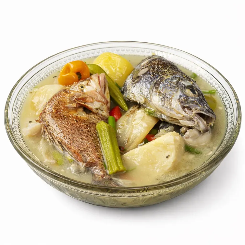 A traditional fish stew from Dominica, featuring fresh fish, ground provisions, and aromatic herbs, resulting in a delightful and hearty dish perfect for gatherings.