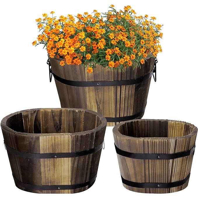 The 3Pcs Wooden Whiskey Barrel Planters set includes three different sizes of rustic flower planters made from wood. The set comes in sizes of 5.3 inches, 7.3 inches, and 8.3 inches, providing variety for different plants and spaces in your garden or home.