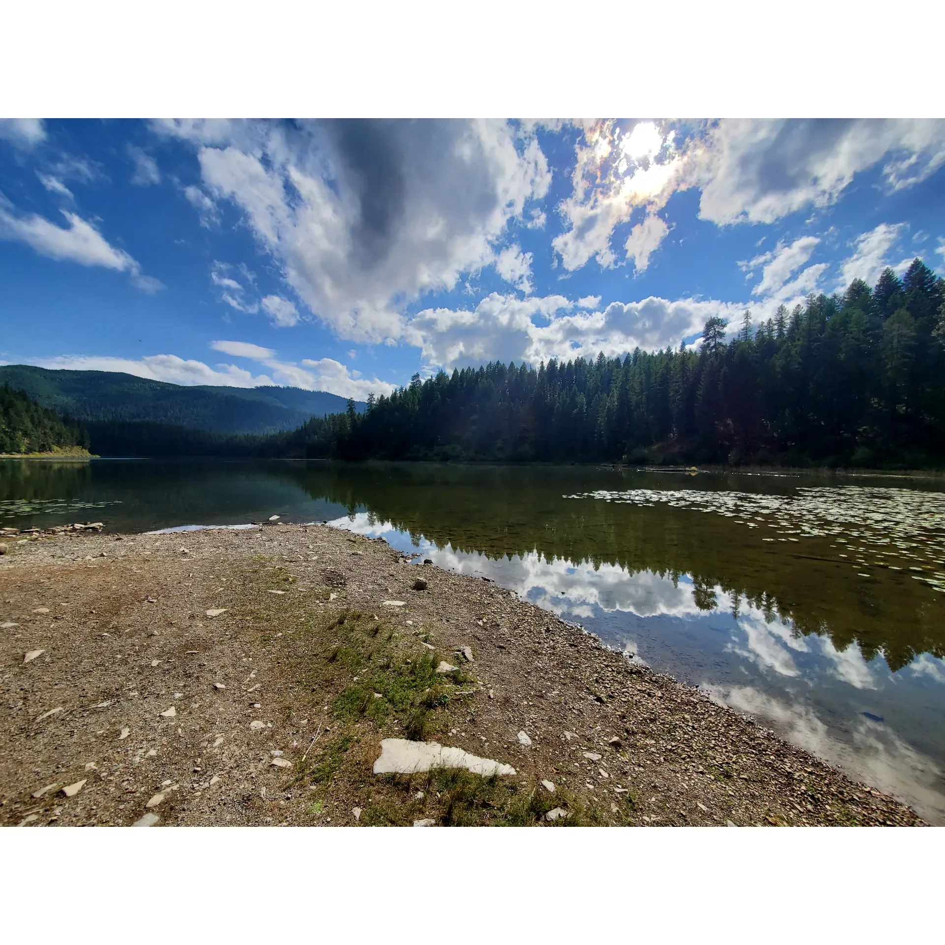 Immerse yourself in the pure tranquility of Kilbrennan Lake Campground, a picturesque outdoor retreat ideally suited for nature enthusiasts and adventure seekers alike. Boasting crystal-clear waters, the lake is an inviting spot for rafting enthusiasts to embark on serene floats, surrounded by the enchanting beauty of untouched landscapes.

Visitors relish the peaceful seclusion offered by the campground, with its five individual sites making it a quiet haven away from the bustle of everyday life. The pristine environment amplifies the joy of the outdoors, with an abundance of wildlife sightings and a serene tapestry of lily pads adorning the water's surface. The campground operates on the revered tradition of "pack it in, pack it out," ensuring that its natural splendor is preserved for all to enjoy.

Those fortunate enough to visit often marvel at the vastness of the open space, delivering a sense of exclusivity that's increasingly rare in popular destinations. Despite its simplicity, the campground features essential amenities, including picnic tables, fire rings, and bear-proof storage boxes, enhancing the rustic outdoor experience with a touch of convenience.

Kilbrennan Lake Campground proves to be a hidden gem for avid morel mushroom hunters, with the surrounding hills and woods offering an abundant harvest. Each campsite is conveniently located at the head of the lake near a grass-and-gravel boat ramp, providing easy access for water activities. With its exceptionally reasonable rates, Kilbrennan Lake Campground stands out as the quintessential spot for those looking to truly disconnect and indulge in the authenticity of the wilderness.

Revered by regulars who return year after year, the campground has earned its reputation as the ultimate lake and wilderness getaway. Its charm captivates visitors, ensuring that each camping trip becomes not just a momentary escape but a cherished memory in the making. Description by ChatGPT.