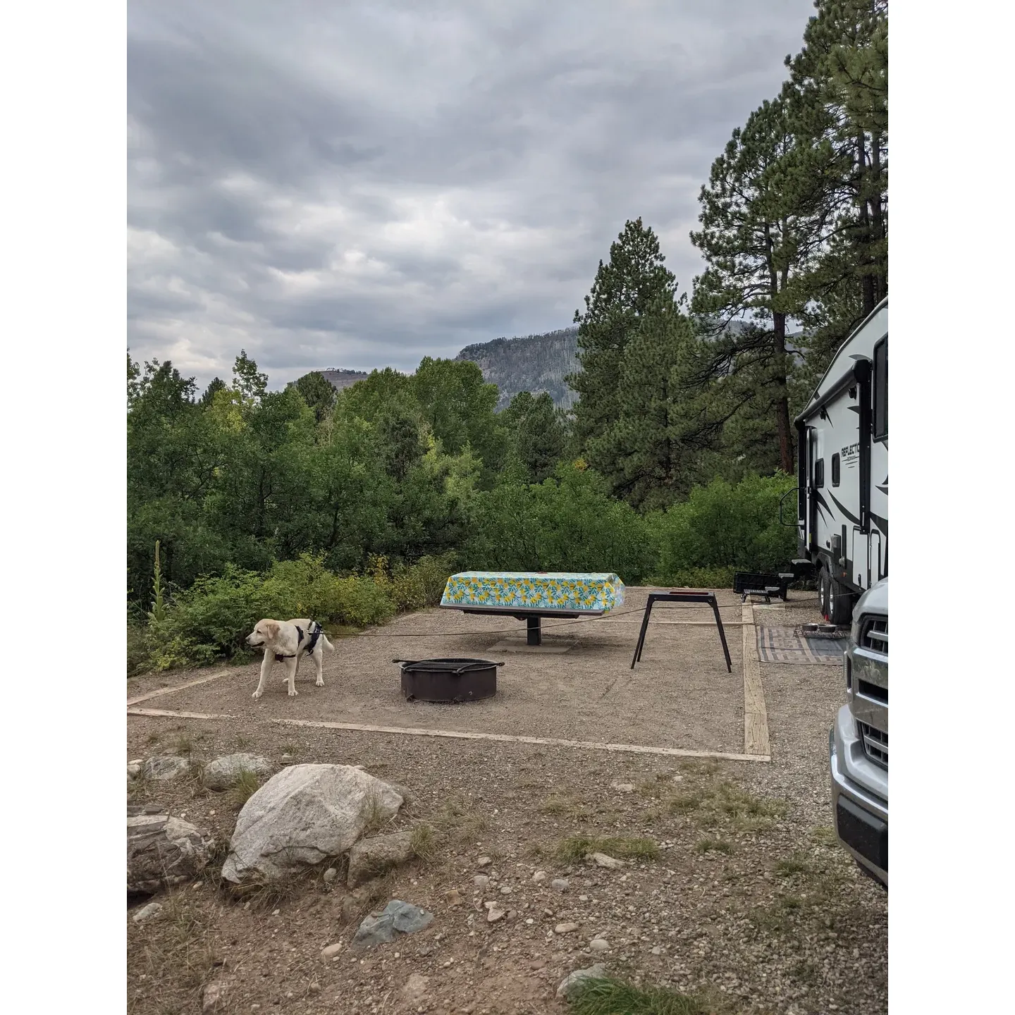 Surrounded by the breathtaking beauty of towering mountains and crystal-clear waters, Haviland Lake Campground is an outdoor enthusiast's paradise. The majestic lake, which serves as the centerpiece of the area, is a sight to behold and a favorite for campers seeking to immerse themselves in nature's splendor. Visitors who choose to come during quieter times are rewarded with serenity and an atmosphere conducive to relaxation and reflection by the water's edge.

A highlight of Haviland Lake Camp is the array of recreational activities available that cater to all interests. Whether you're an avid hiker craving to explore well-maintained trails that offer astonishing views or a stargazer looking for an unobstructed celestial show, this campground provides an idyllic setting. Water enthusiasts have access to the lake for a refreshing day of watersports or tranquil fishing trips.

The campground itself boasts a variety of facilities. Access to water stations is ample, ensuring campers have the fresh water they need. The offerings of electrical hookups cater to those looking for a touch of modern convenience amidst their rustic escape. Moreover, the availability of firewood on-site adds to the allure of peaceful evenings around a crackling fire.

During the autumn months, the place displays a striking charm as the changing foliage sets the landscape ablaze with color. In this season, when services are limited, visitors with a spirit of adventure can enjoy the freedom of boondocking, making for an authentically rustic experience complemented by magnificent lake views.

Whether you're making memories at a prime lakeside campsite or just passing by for a soul-stirring day trip, the campground's dedication to preserving the natural aura of the area ensures that every visit is filled with pure, undisturbed outdoor enjoyment. The quiet corners of the park offer a gentle reminder of the timeless allure of the wilderness, where each guest can create their unique narrative of adventure and tranquility. Description by ChatGPT.