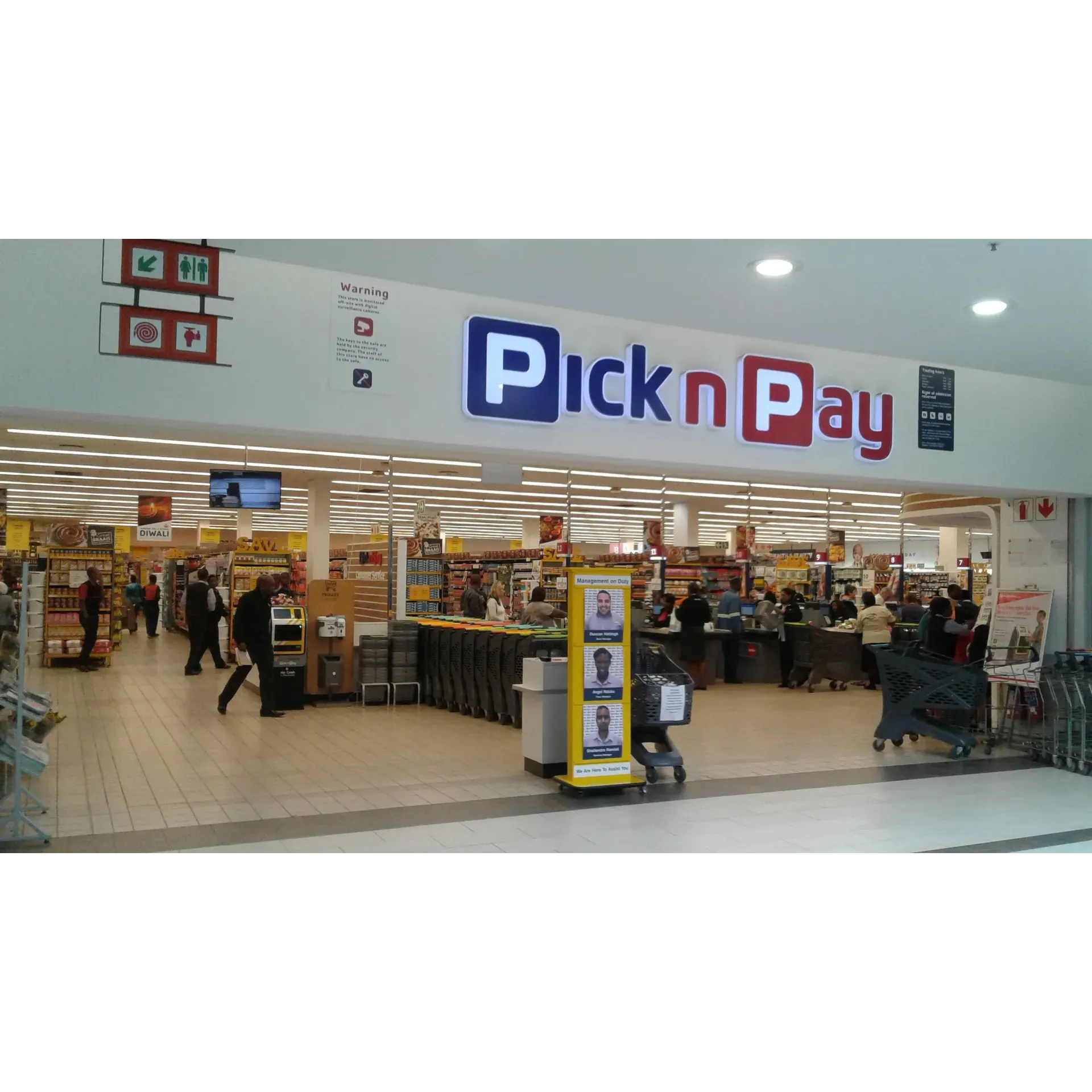 Located in the bustling hub of Umhlanga Crescent, Pick n Pay stands as a beacon of retail convenience and variety for the discerning shopper. This supermarket distinguishes itself with its recently enhanced layout, which now boasts a brighter, more spacious shopping environment, perfect for a comfortable and relaxed browsing experience. Shoppers can expect to find everything they need as the store continuously improves and updates its shelving with a wide array of goods to cater to all shopping lists.

True to its commitment to customer satisfaction, Pick n Pay offers an array of facilities including ample parking, complete wheelchair accessibility, and the added convenience of an adjoining liquor store for those looking to purchase a selection of fine wines and spirits.

Not only does the store provide the essentials, but it also excels in its culinary offerings. A standout feature is their in-house roast chicken, renowned for its succulent butter-based preparation—a definite must-try for visitors.

For the fashion-conscious, the Pick n Pay Clothing section remains a popular destination for high-quality, affordable attire, providing a wide selection of trendy and stylish options for every occasion. With the added option of online shopping, this branch remains attuned to the evolving needs of its customers, promising a dedicated commitment to enhance its service to match the quality of its products.

As it undergoes its transformation, Pick n Pay at Umhlanga Crescent mall continues to be a favored shopping venue, eagerly anticipated to reveal its full potential once the upgrade is complete. It promises to be an inviting destination for both regular patrons and newcomers, looking to indulge in its offerings ranging from everyday necessities to delightful treats. Description by ChatGPT.