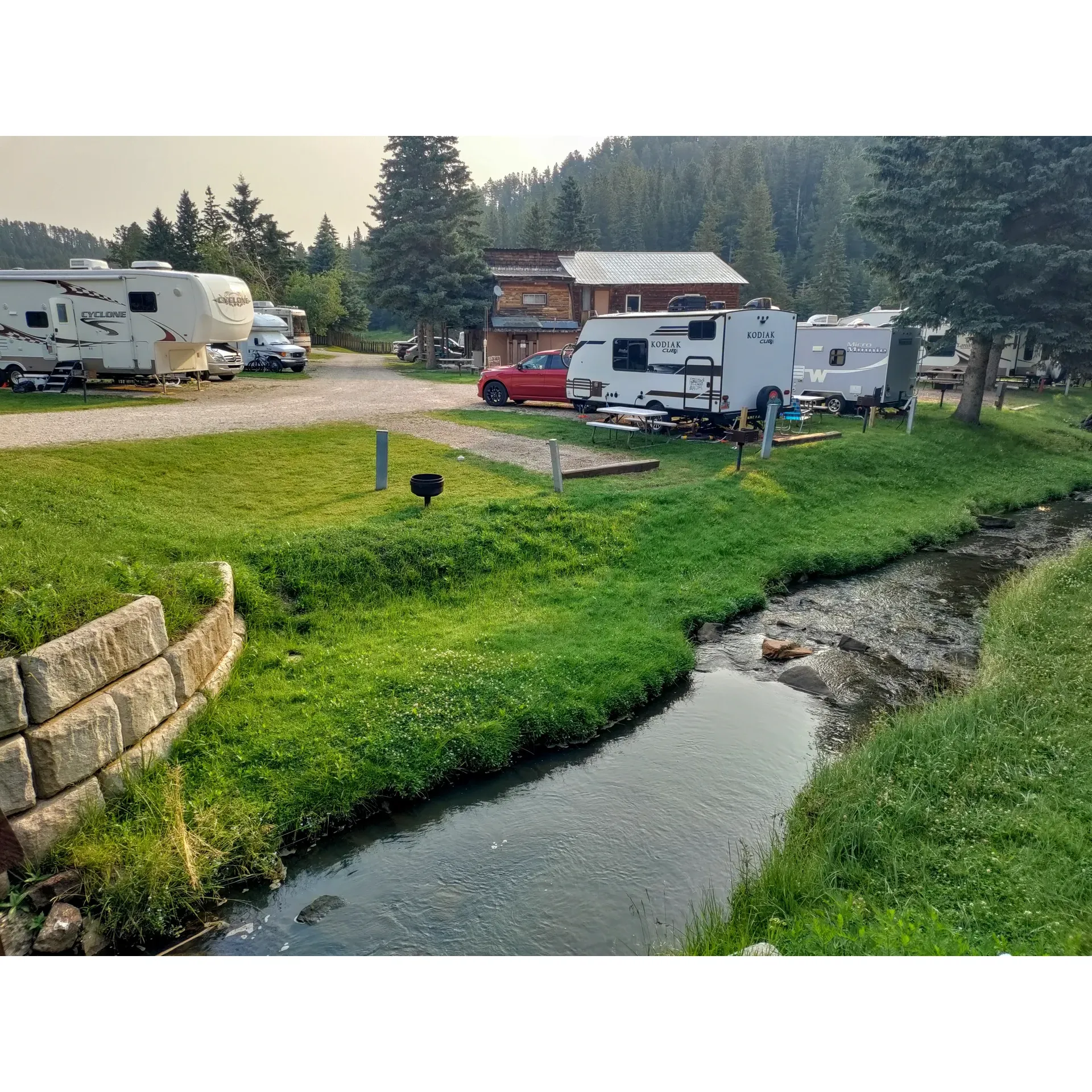 Discover the perfect blend of outdoor adventure and culinary delight at Fish N Fry Campground. Here, guests are treated to a rare dining experience where fresh trout is caught directly from the pond and served tableside, showcasing the epitome of freshness. Opt for the thrill of catching your own dinner or watch skilled staff reel in your meal for an unforgettable show.

Beyond the unique dining, this family-friendly destination offers a plethora of amenities. With clean, well-maintained facilities, including restrooms and showers, the convenience and comfort of home are never far away. Accommodations range from spacious campsites to cozy cabins, suitable for any traveler, with ample space even for larger RVs, ensuring a perfect fit for all guests.

The campground's atmosphere is further enriched by the inviting pool and the charming creek that flows throughout, offering a tranquil backdrop for relaxation and play. Engaging activities such as fishing provide educational experiences, especially for the younger guests, making it a fantastic way to create lasting memories.

The welcoming and diligent staff truly rounds out the stay, with a commitment to service that shines through in every aspect of the campground's operations. They go above and beyond, ensuring that any needs or mishaps are met with a helping hand and a smile.

Whether you're looking for a refreshing break from typical vacation dining, or an all-encompassing retreat into the great outdoors, Fish N Fry Campground delivers with excellence, leaving visitors yearning to return and soak up more of the delightful experiences on offer. With a touch of home-style charm, excellent culinary offerings, and a friendly community vibe, it stands out as a premier destination in the hills of South Dakota. Description by ChatGPT.