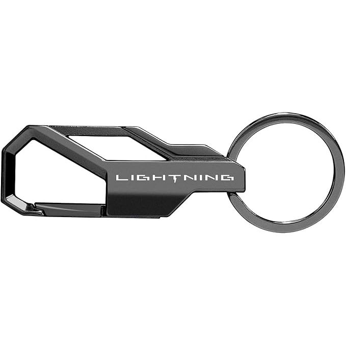 The Ford F-150 Lightning Gunmetal Black Carabiner-Style Snap Hook Metal Key Chain Keychain is an officially licensed product featuring the iconic Ford F-150 Lightning logo. This key chain is designed in a sleek gunmetal black color, adding a touch of style to your keys or other accessories.