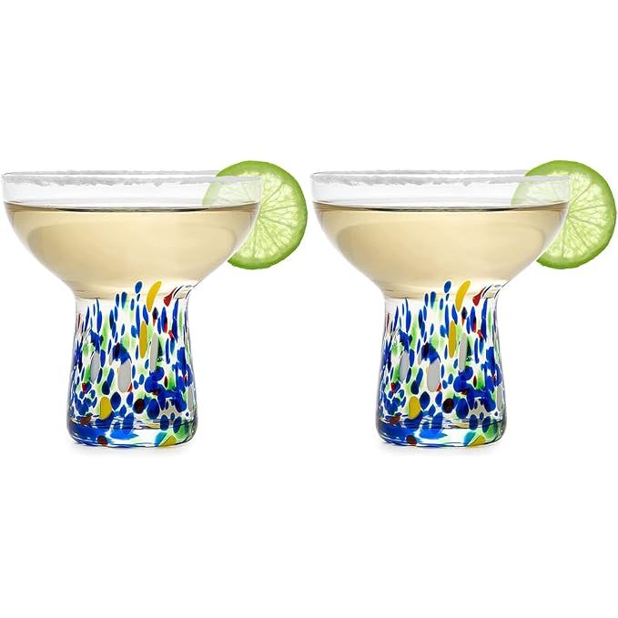 These Large Stemless Margarita Glasses are a set of two, 14oz hand blown glasses made from luxury confetti glass. The versatile design makes them suitable for serving a variety of beverages including margaritas, martinis, cocktails, water, wine, dessert, and champagne.