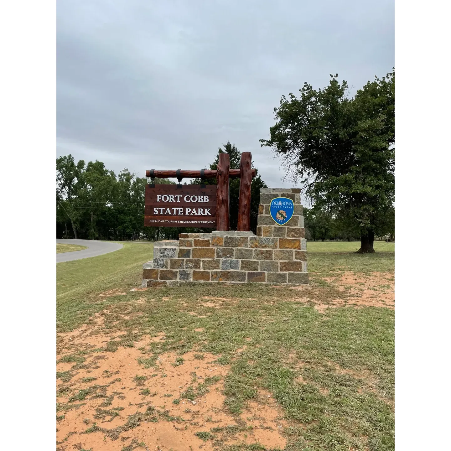 Blackjack Cove Campground, located within Fort Cobb State Park, offers an inviting retreat for campers seeking a serene outdoor experience. With spacious and well-maintained camping spots, the campground guarantees ample room for RVs, motorhomes, and tents alike. Surrounded by an abundance of beautiful trees set in a lovely cove, the site provides a picturesque setting for nature enthusiasts and those looking to unwind.

Campers can benefit from a variety of on-site amenities, including a charming playground that offers fun for children, and convenient access to two spotless bathrooms, enhancing the comfort of your stay. The presence of a fishing dock invites anglers to indulge in their passion, while a designated cove area allows for safe swimming, perfect for family-friendly water activities.

The campground also boasts proximity to inviting hiking trails that present an opportunity for exploration and witnessing the natural beauty of the park. With lots of shade available, visitors can enjoy the outdoors while staying cool, even on warmer days.

Additionally, the inviting camp host is renowned for their friendliness and readiness to assist, ensuring that every visitor's camping experience is enjoyable and hassle-free. The touch of warm hospitality, combined with the pristine condition of the site, makes Blackjack Cove Campground a delightful choice for both seasoned campers and those embarking on their first outdoor adventure.

Whether you're seeking a peaceful getaway, a family vacation spot, or a base to explore the great outdoors, Blackjack Cove Campground at Fort Cobb State Park stands out as an excellent destination to create good times and lasting memories. Description by ChatGPT.