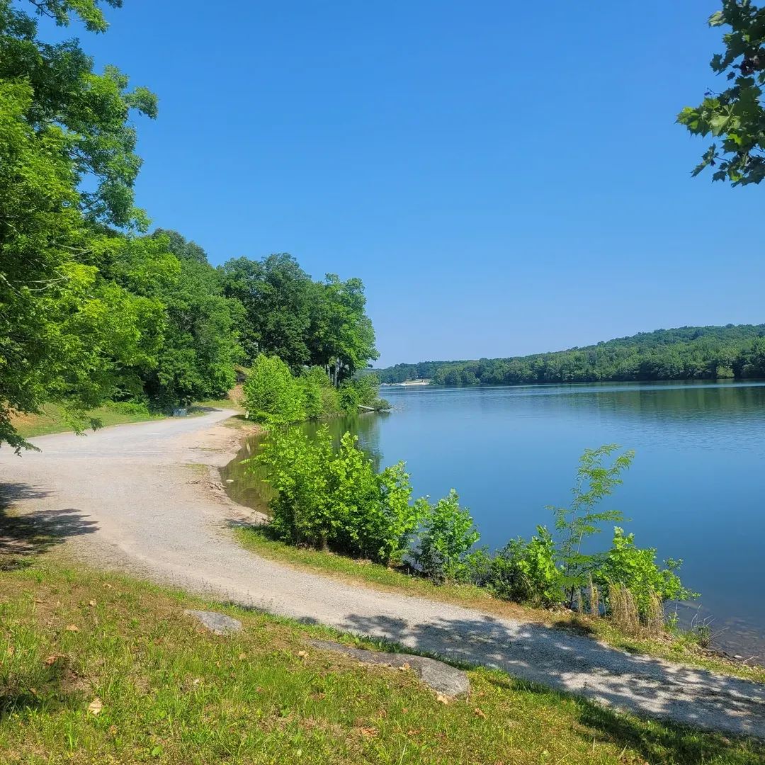 Birmingham Ferry Campground & Boat Ramp offers an idyllic escape into a picturesque backcountry setting perfect for outdoor enthusiasts. With a prime location that provides incredible access for kayak adventurers, this destination is a haven for those seeking to drift along the water or immerse themselves in fishing endeavors. Campers looking for a tranquil retreat will appreciate the seclusion offered by various tent sites, where one can bask in serene moments enveloped by natural beauty.

This splendid campground is much more than a place to pitch a tent. It's an opportunity to experience the most extraordinary sunset views that transform the sky into an artist's canvas every evening. Visitors are often mesmerized by the vibrant colors reflecting over the water, creating lifelong memories and picture-perfect moments with loved ones or in the quiet company of nature.

Committed to maintaining a clean and orderly space, Birmingham Ferry ensures that the essence of rustic backwoods camping is preserved while providing the necessary comforts, such as KIT Moe's restrooms, for a hassle-free stay. Those wishing to connect with nature without the distractions of modern facilities find solace here, enjoying the neatly kept grounds and the simplicity of an electricity-free environment.

Birmingham Ferry Campgrounds & Boat Ramp promises not just a campsite but a cherished sanctuary for families, couples, and solo travelers alike. It's a place where fishing tales are spun, life's daily hustle is forgotten, and the peace and delights of the natural world reign supreme. It's no mystery why lifelong campers continue to return to this cherished spot weekly for boating and fishing, solidifying its reputation as a must-visit destination steeped in beauty and tradition. Description by ChatGPT.