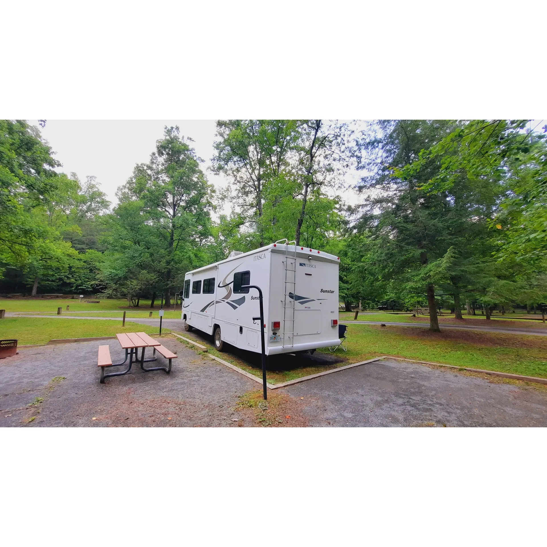 Perched within the serene expanse of the US Forest Service's Cheoah Ranger District lies the tranquil oasis of Tsali Campground, a paradise for outdoor enthusiasts seeking rejuvenation amidst nature's splendor. Visitors rave about the spaciousness of the campsites, which offer ample room for relaxation and are complemented by impeccably maintained facilities. 

Adventurers are enticed by the picturesque trails weaving through the landscape, offering both peaceful treks and adrenaline-pumping rides. Cyclists, in particular, find the campground a perfect base, with easy access to challenging and well-kept trails that boast stunning views and thrilling descents. The proximity to Lake Fontana adds another layer of allure, with its shimmering waters providing a picturesque backdrop for a range of recreational activities. 

Camping at Tsali is an escape into a world of tranquility where the calls of whippoorwills and bird songs signal the dawning of new days filled with possibility. With sites accommodating both traditional tent camping and hammock enthusiasts, the campground ensures a harmonious blend with nature, promoting the use of tree-friendly gear. Accessibility is another highlight, as the campground welcomes a variety of RV sizes, with careful driving advised to navigate the natural beauty surrounding each site.

Guests appreciate the value-for-money experience, with nightly rates that are hard to surpass considering the wealth of natural beauty and cleanliness of the amenities. Tsali Campground stands as an exceptional destination for those looking to unwind in a peaceful setting or for thrill-seekers eager to explore the great outdoors on two wheels, all within the embrace of the majestic US Forest Service lands. Description by ChatGPT.