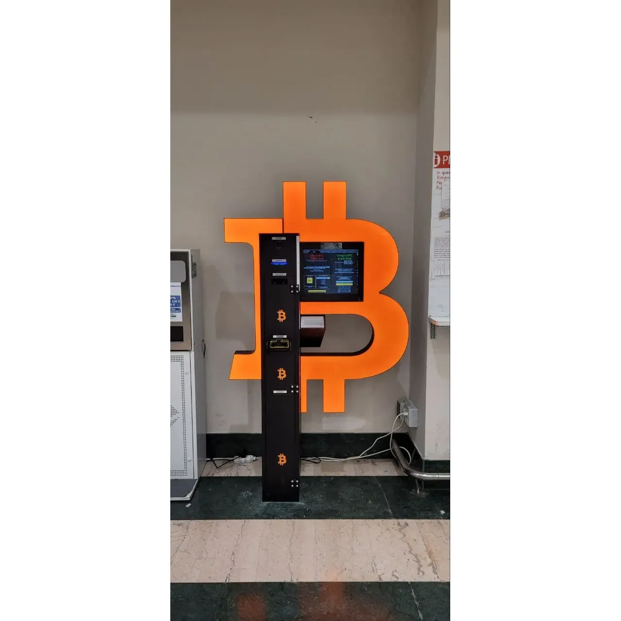 Bancomat Bitcoin ATM by Shitcoins.club presents an innovative and convenient solution for cryptocurrency enthusiasts and casual users alike. Celebrated for its reliable operation, this state-of-the-art cryptomat offers seamless transactions that cater to the needs of a diverse client base. Patrons have taken to platforms to express their gratitude and satisfaction with the functionality of this service, highlighting the smooth experience they've encountered. The Bancomat provides a straightforward and user-friendly interface, ensuring that every interaction with the machine is fine-tuned and hassle-free.

The ATM's robust system is designed to facilitate secure and efficient exchanges, allowing users to confidently manage their digital currency investments. Equipped with leading-edge technology, the Bancomat Bitcoin ATM operates impeccably, backed by positive user feedback. This cryptomat serves as a reliable point of access to the ever-expanding world of cryptocurrencies, ensuring that every individual has the resources they need to keep pace with the dynamic realm of digital finance. It's a truly remarkable asset for those looking to handle their crypto transactions quickly and effortlessly. Description by ChatGPT.